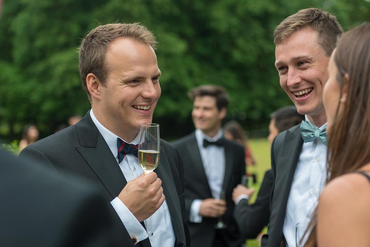 Guests enjoying a Cambridge party reception outdoors