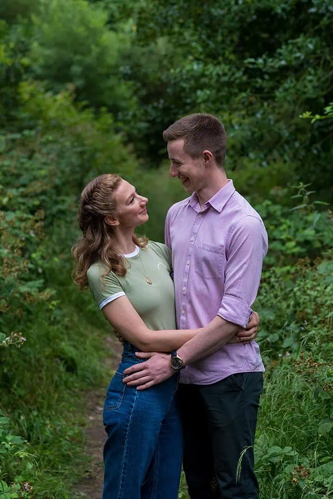 Gift Vouchers 3 Couple smiling together on a woodland path
